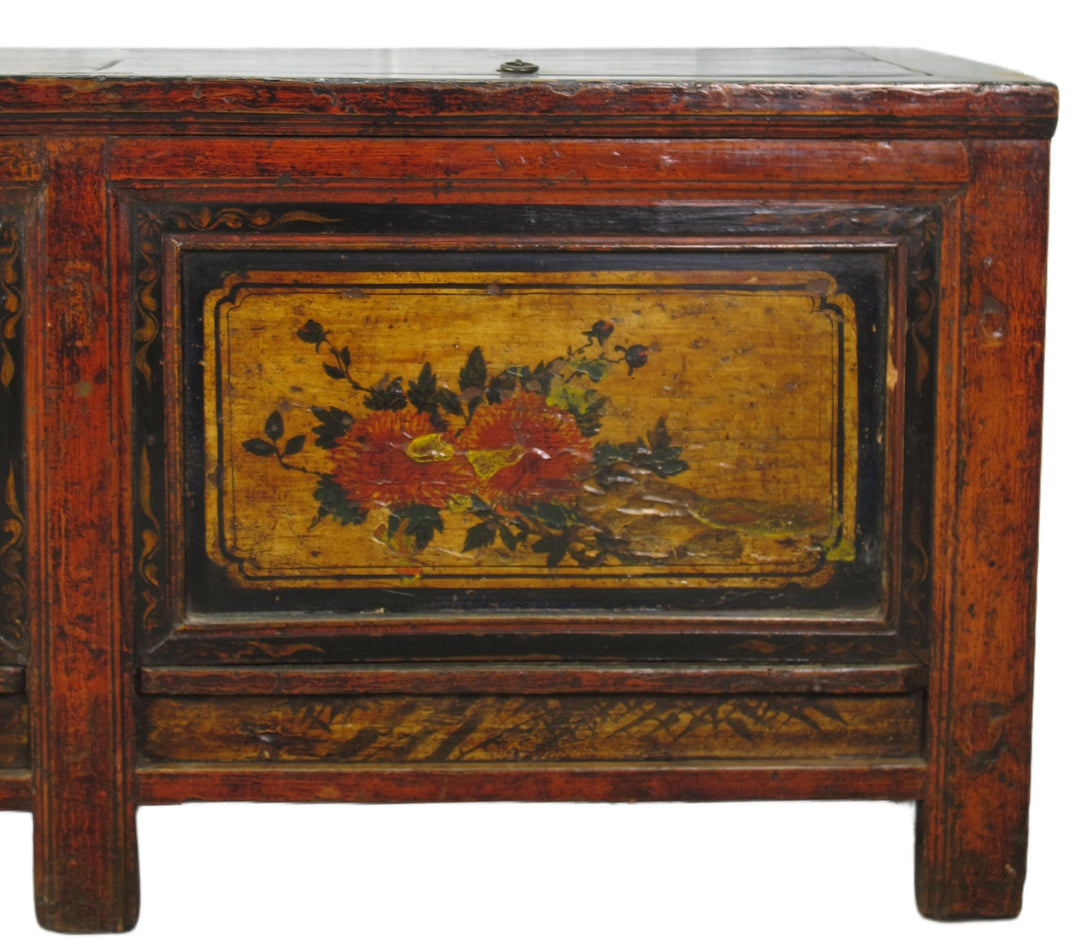 Vintage wooden cabinet with floral painting on a white background