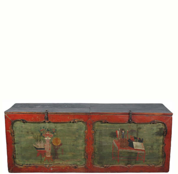 Vintage wooden trunk with green and red paint on a white background