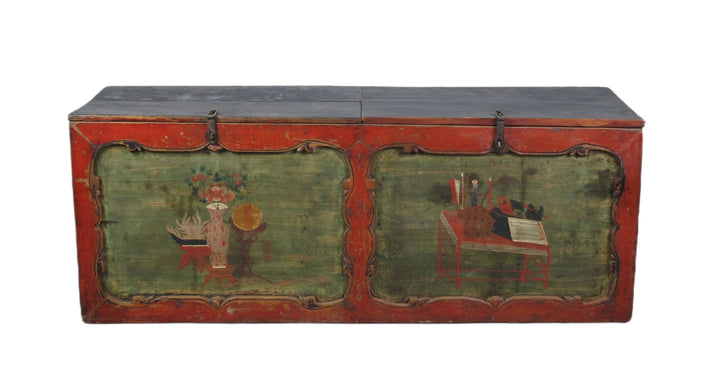 Vintage wooden trunk with painted scenes on a white background