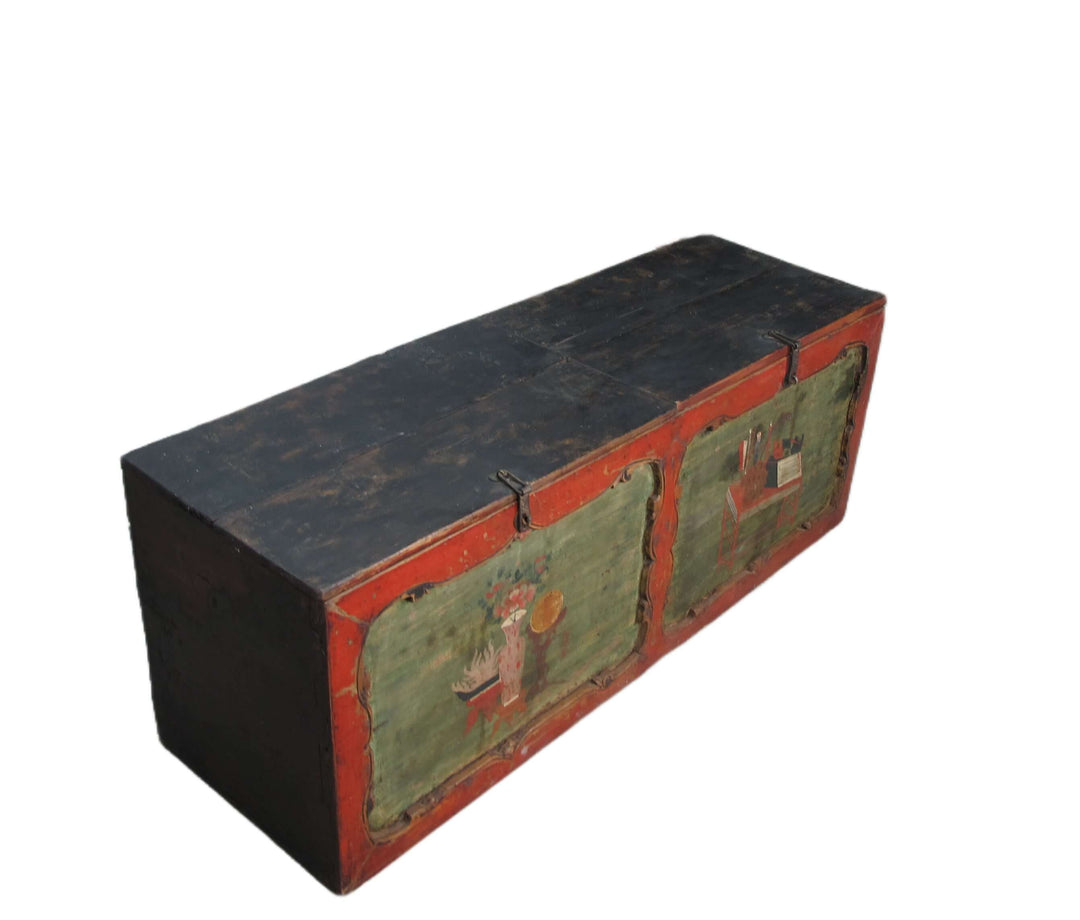 Wooden box with black top and green sides on a white background