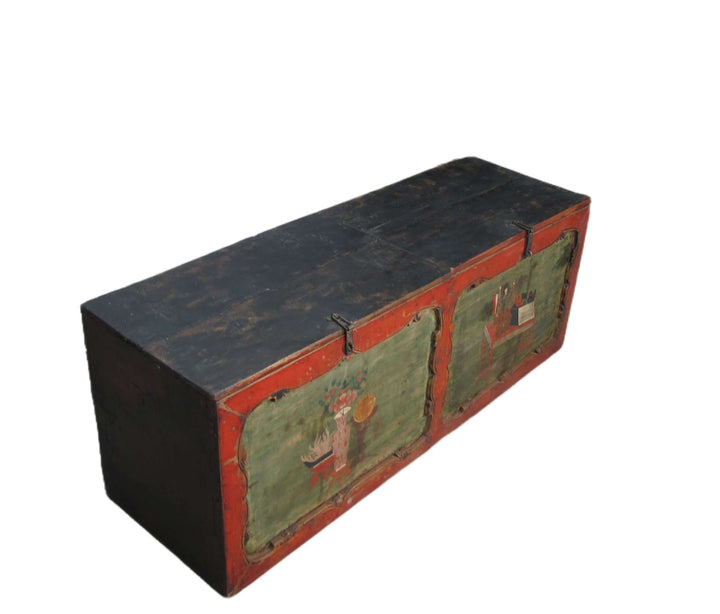 Wooden box with black top and green sides on a white background