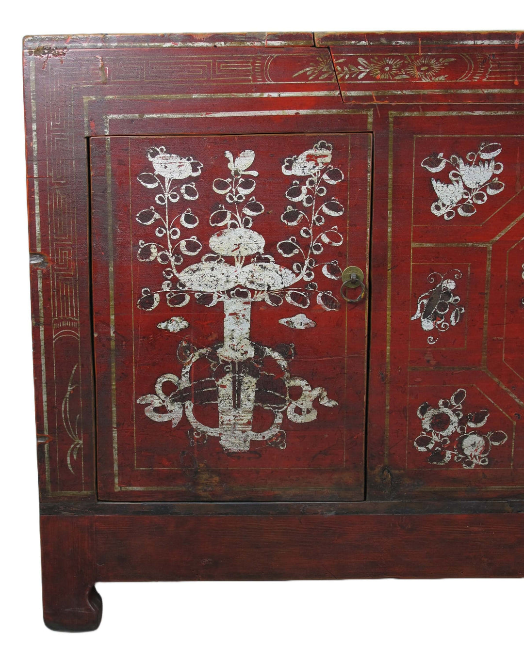 Red wooden cabinet with white floral and butterfly designs on a white background