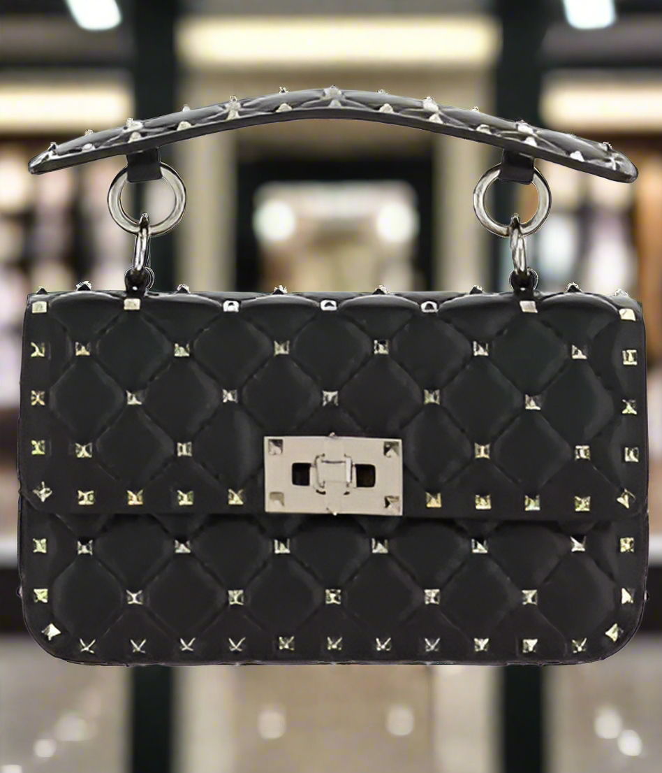 Valentino Garavani women's designer handbag in leather Luxury Valentino Garavani shoulder bag with iconic studs Valentino Garavani crossbody bag in black with gold accents