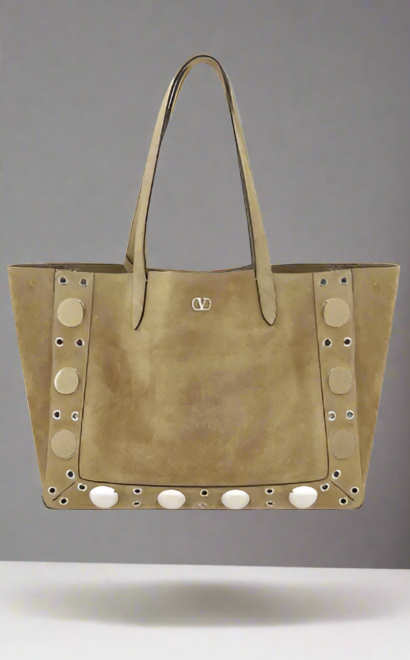 Valentino Garavani women's designer handbag in leather Luxury Valentino Garavani shoulder bag with iconic studs Valentino Garavani crossbody bag in black with gold accents