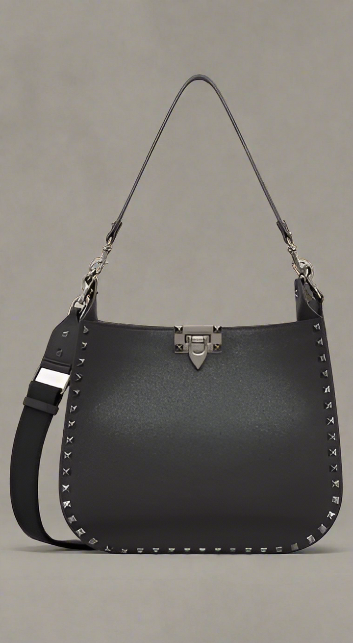 Valentino Garavani women's designer handbag in leather Luxury Valentino Garavani shoulder bag with iconic studs Valentino Garavani crossbody bag in black with gold accents