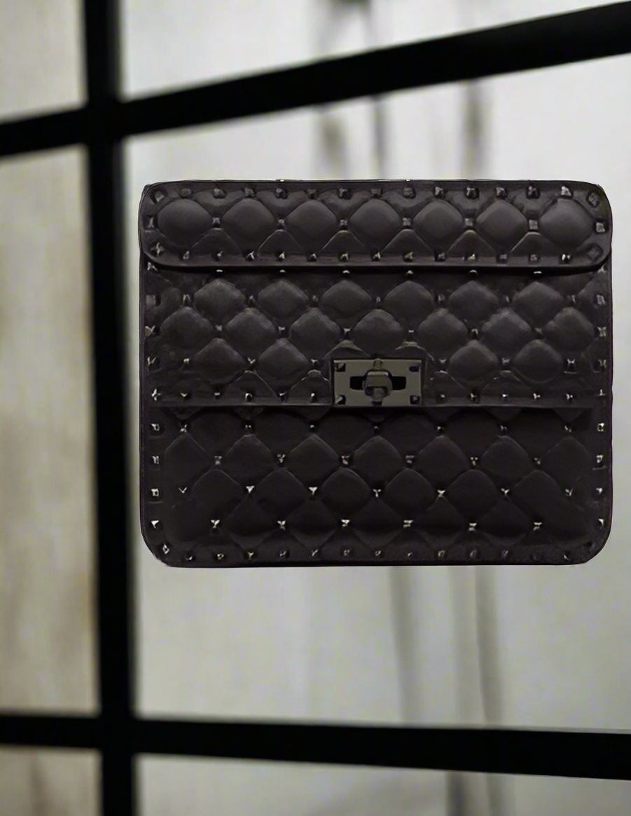 Valentino Garavani clothing, designer bags, and accessories collection at STORE 7994