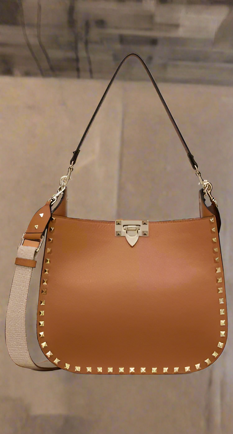 Valentino Garavani clothing, designer bags, and accessories collection at STORE 7994
