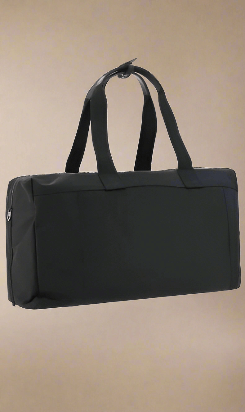 Travel Bag by Dolce&Gabbana, top closure with double-slider zipper, zippered welt pocket on back, iconic brand monogram printed in contrast on front, patch pocket on front panel, removable and adjustable nylon shoulder strap.

