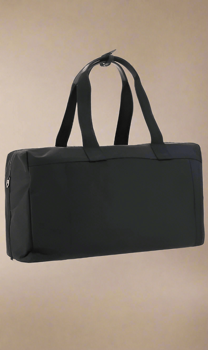 Travel Bag by Dolce&Gabbana, top closure with double-slider zipper, zippered welt pocket on back, iconic brand monogram printed in contrast on front, patch pocket on front panel, removable and adjustable nylon shoulder strap.

