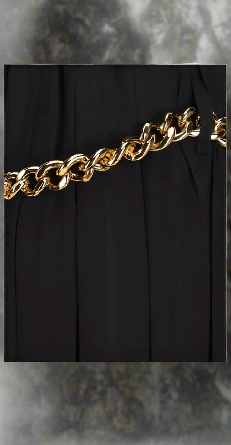 Balenciaga Long Skirt, elastic waistband, foot length, gold chain detail at waist.

