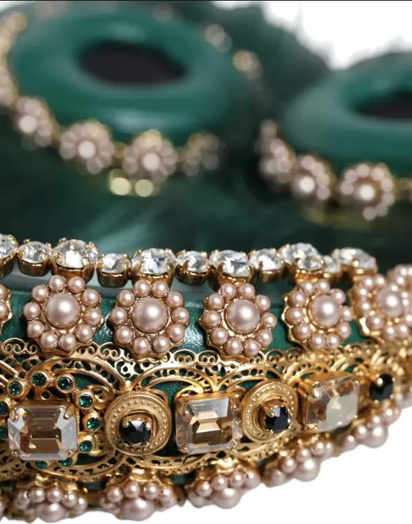 Decorative bangles with pearls and gemstones on a green background