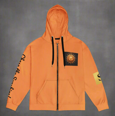 Orange hoodie with black sun design on chest and text on sleeves against a gray background