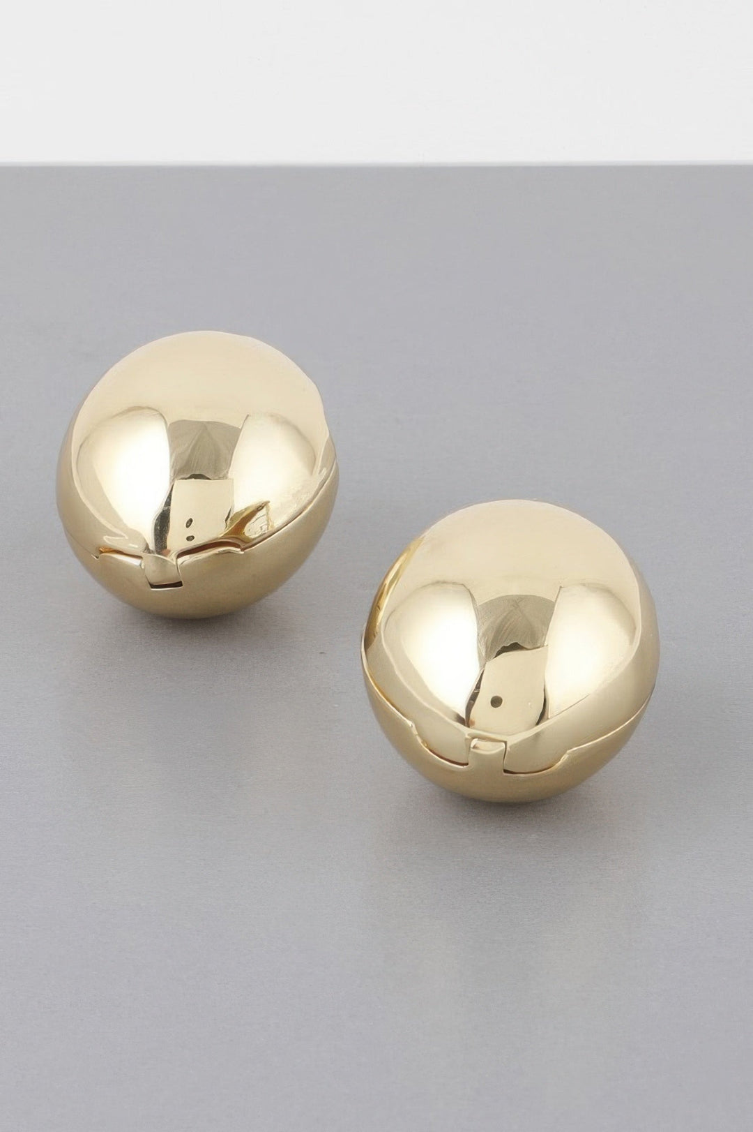 TRIBECA Empty Shell Clasp Earrings: NYFW BYMANYC ® New York