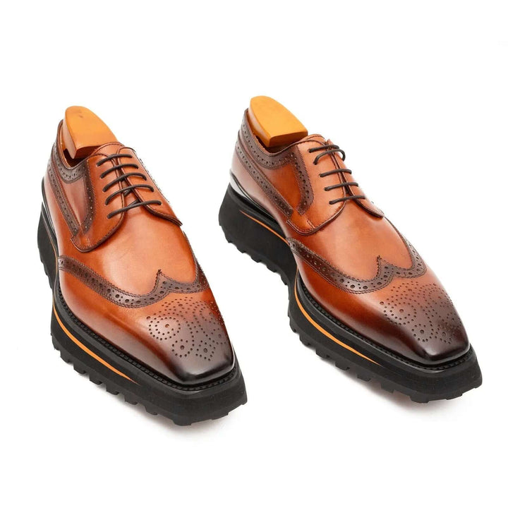 Thick-soled calfskin formal brogue derby shoes Brown by DV DIVINCH, showcasing detailed brogue perforations and a lug sole.