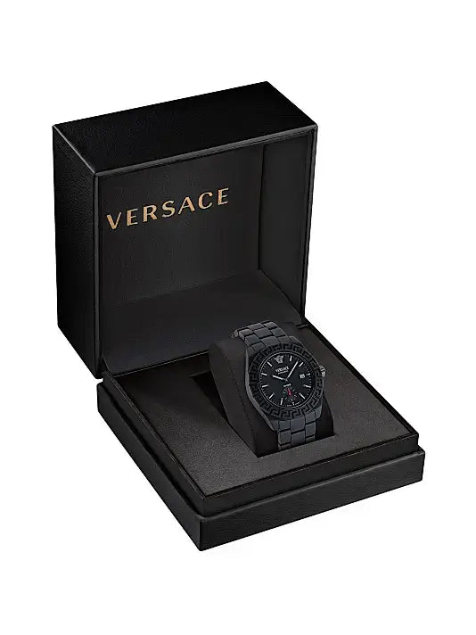 Black Versace watch in a branded box on a white background