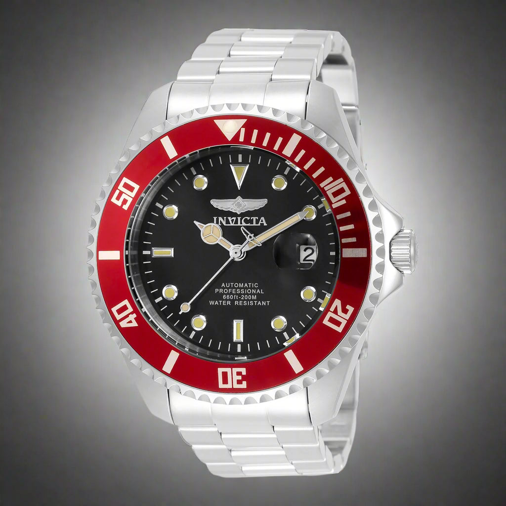 INVICTA Pro Diver men's watch with stainless steel band INVICTA black graphic t-shirt with logo front Gold-tone INVICTA chronograph wristwatch close-up INVICTA men's button-down shirt with embroidered detail INVICTA oversized sport watch and branded appar