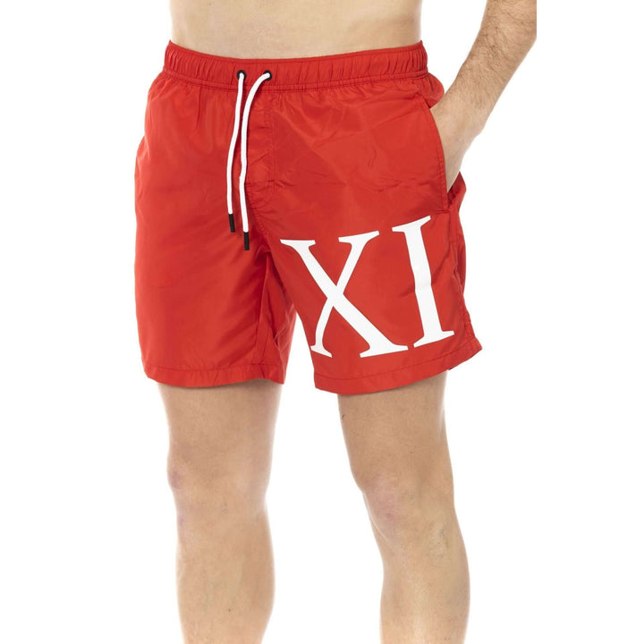Men’s Bikkembergs beachwear and swimwear collection at STORE 7994 featuring modern swim trunks and sporty beach styles for summer.
