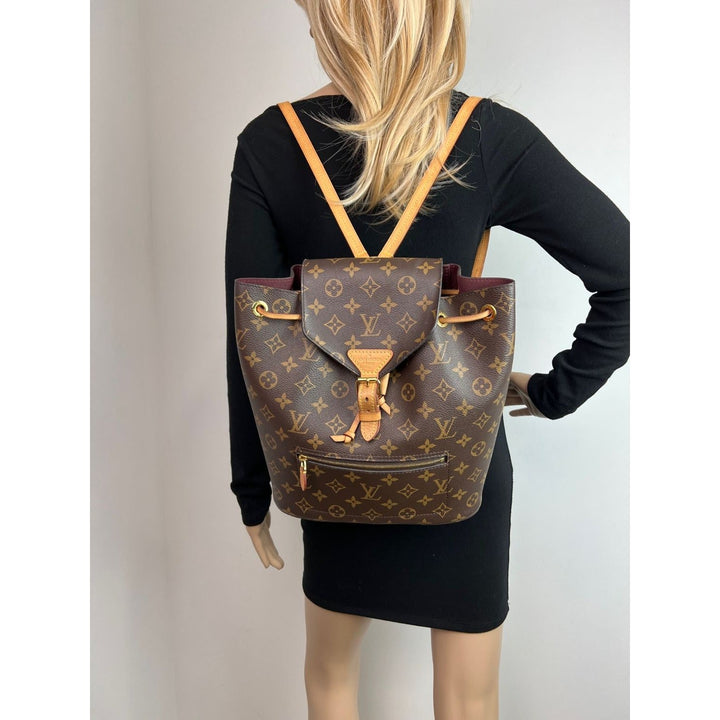 LOUIS VUITTON Montsouris NM Monogram Backpack shown on model, luxury bags with distinctive monogram pattern.