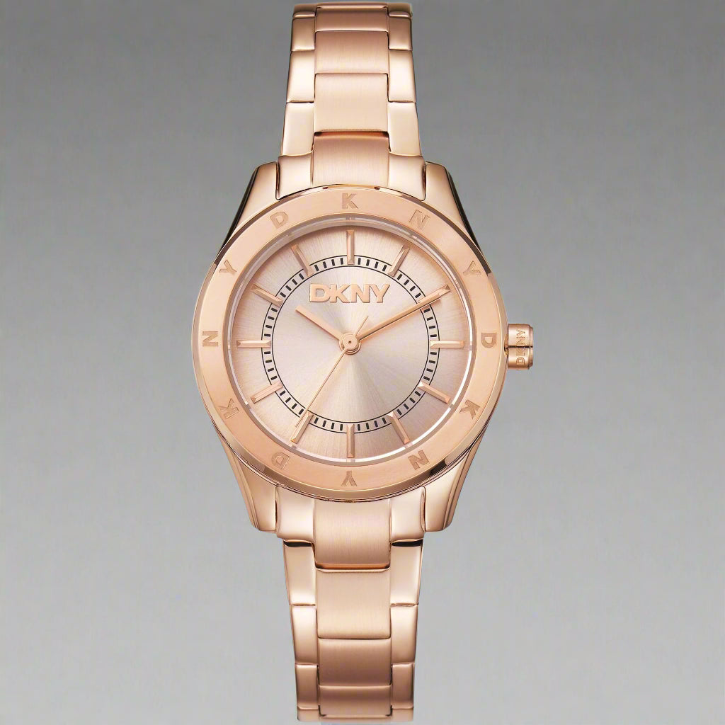 DKNY women's analog quartz gold tone Watches