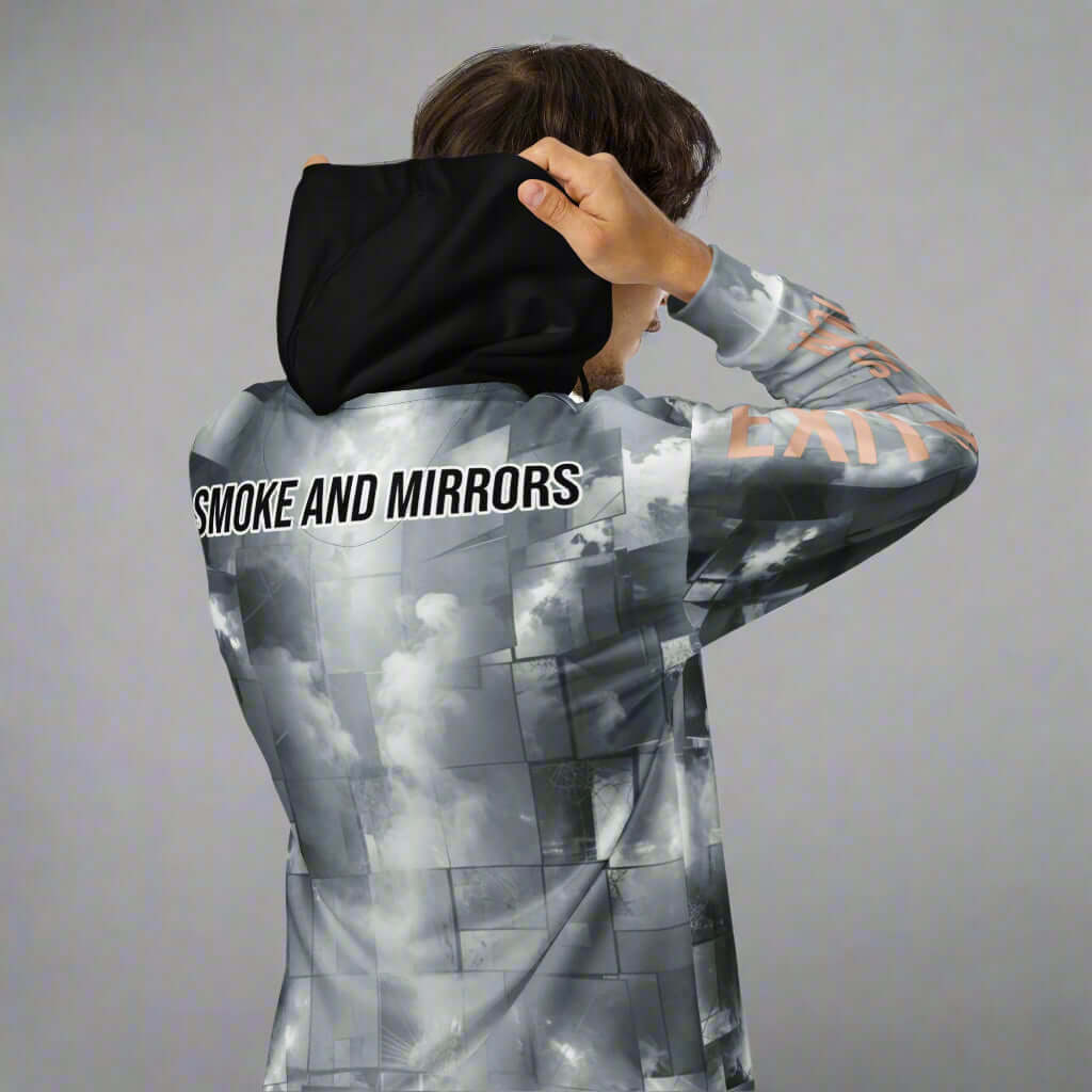 man posing with back of hoodie