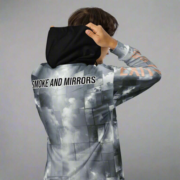 man posing with back of hoodie