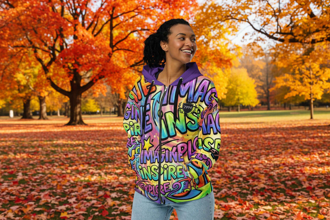 S7 Multicolor Inspiration Hoodie – Purple Edition featuring vibrant colors and inspirational words in a scenic autumn setting.