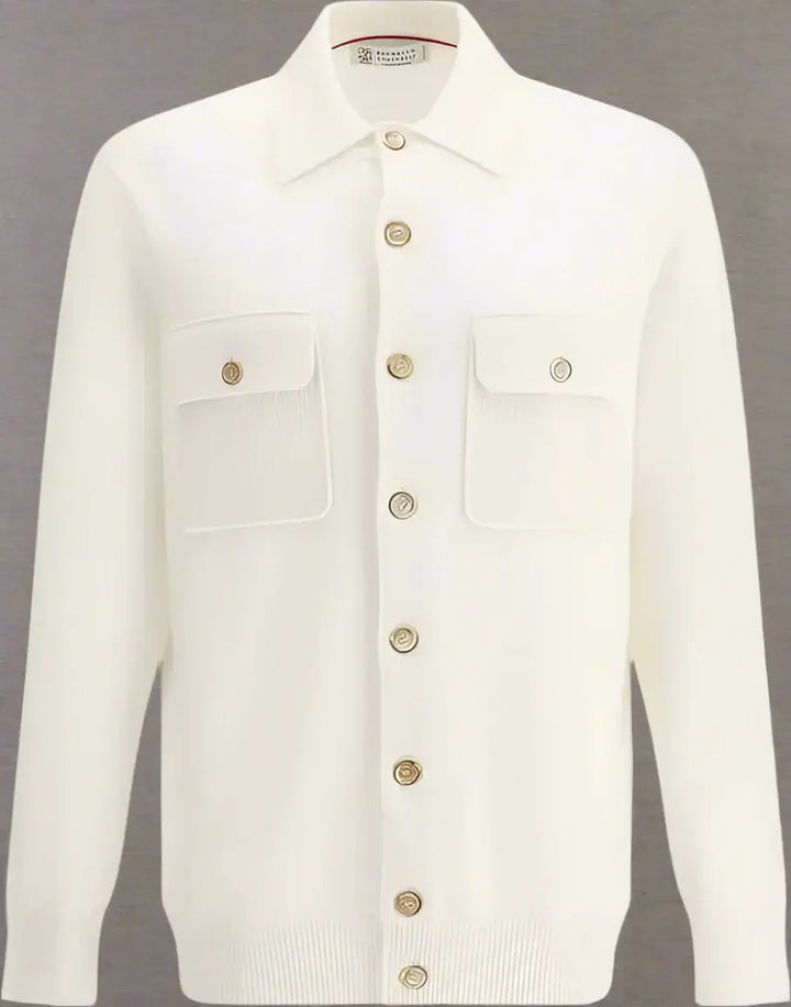 White denim jacket with button details on a white background