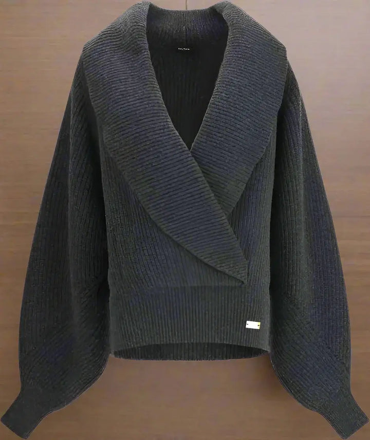 Gray knitted sweater with a V-neck on a white background