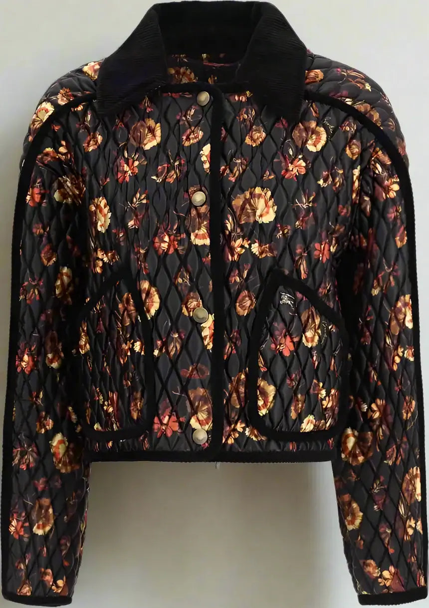 Floral quilted jacket with black collar on a white background
