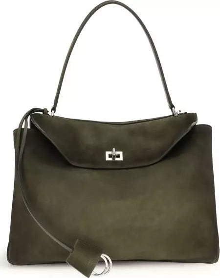 Green handbag with a shoulder strap on a white background