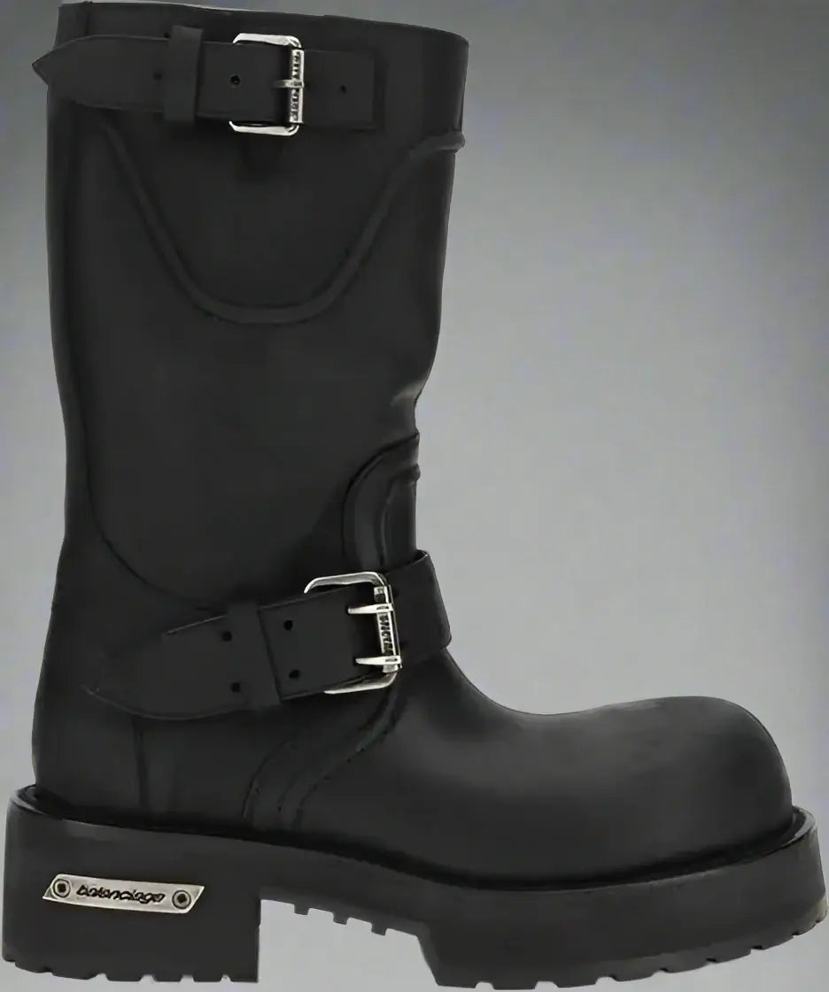 Black leather boot with buckles on a white background