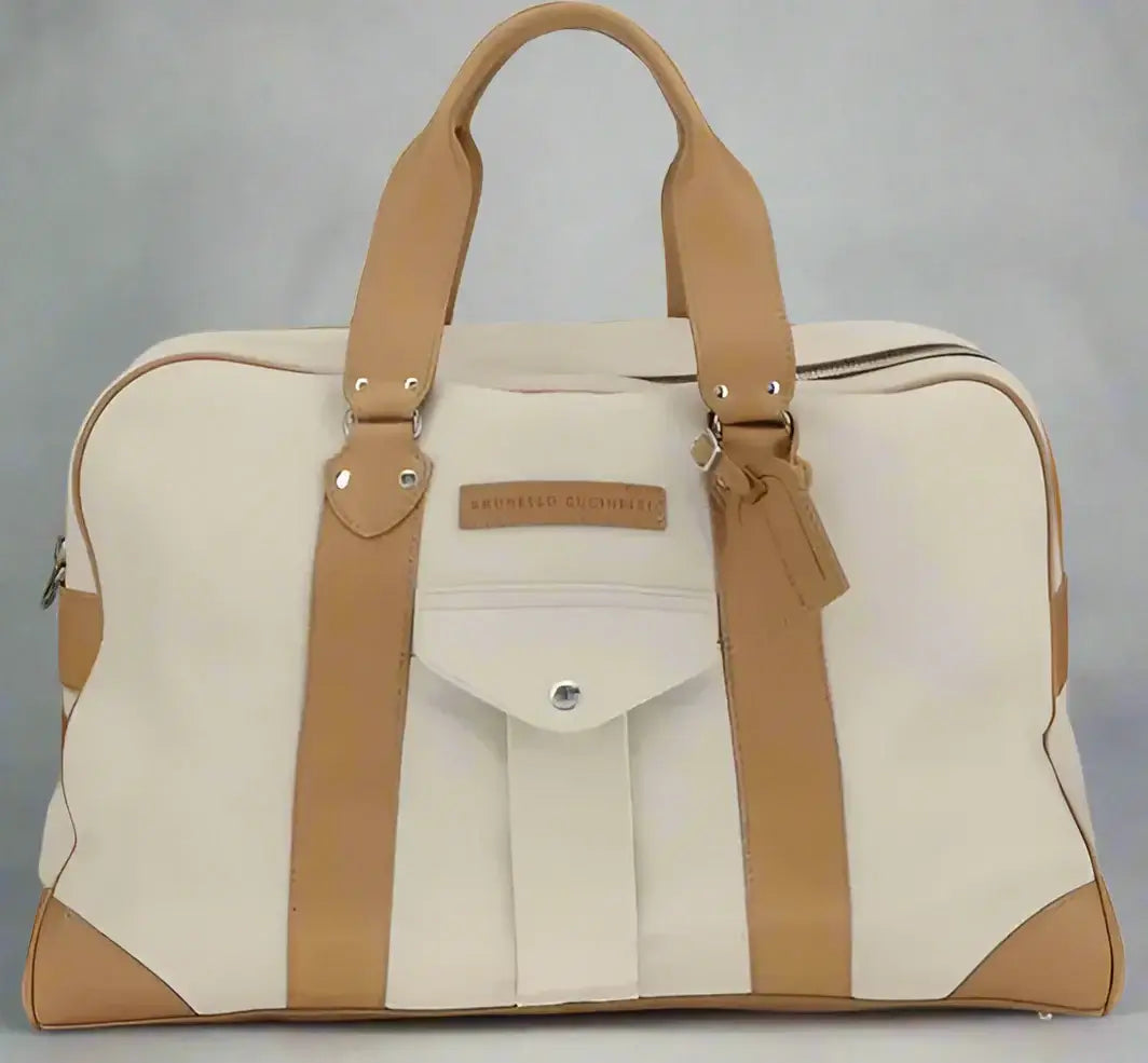 Beige and brown travel bag with visible brand name on a white background