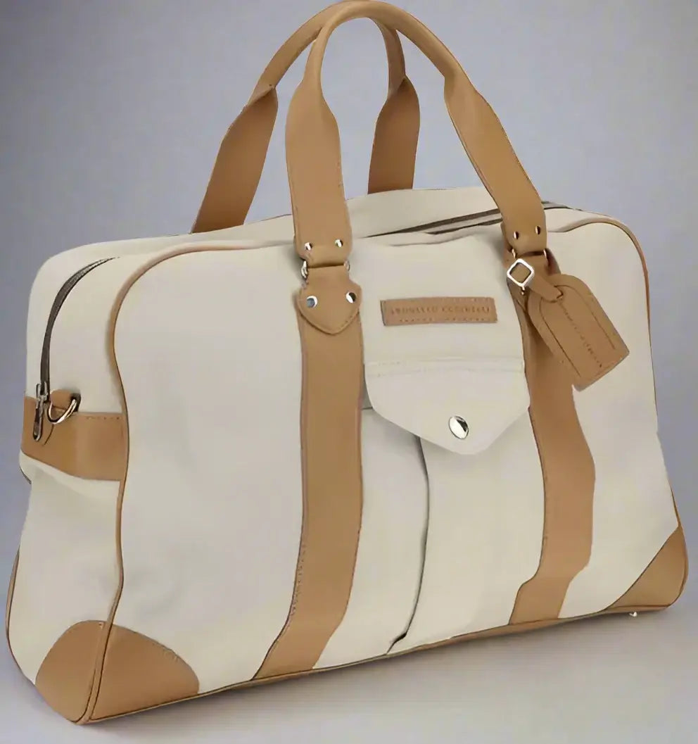 Beige and brown travel bag with leather straps on a white background