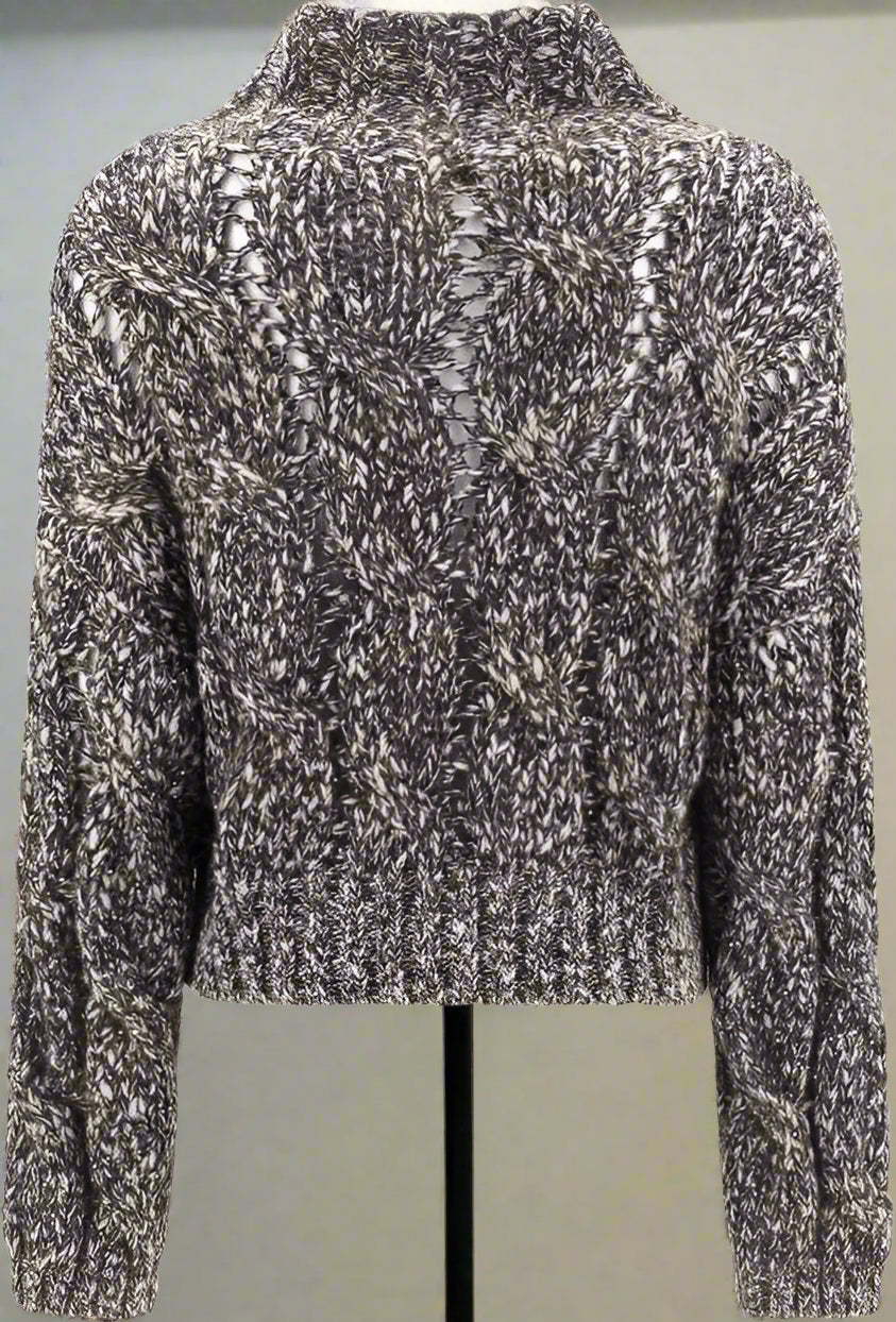 Textured sweater with a pattern on a white background