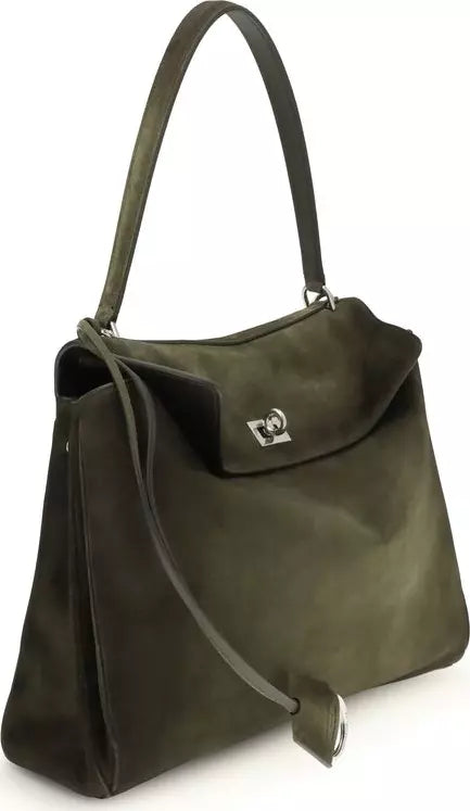 Green handbag with a visible brand logo on a white background