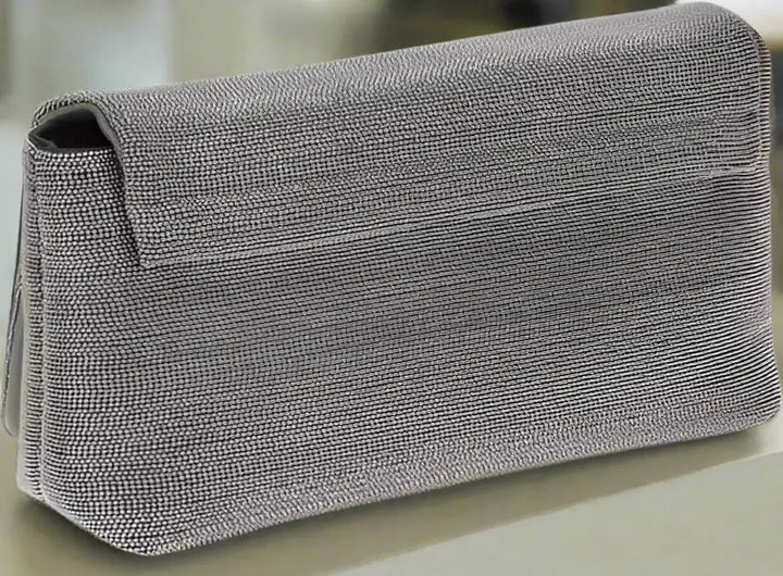 Gray textured clutch bag on a white background