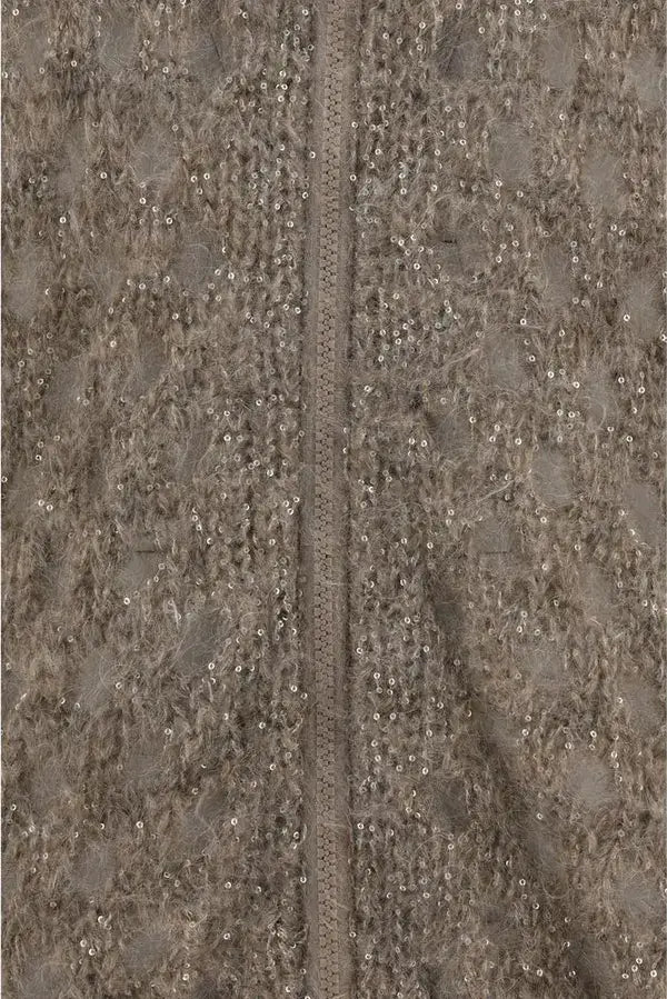 Close-up of a textured surface with a zipper