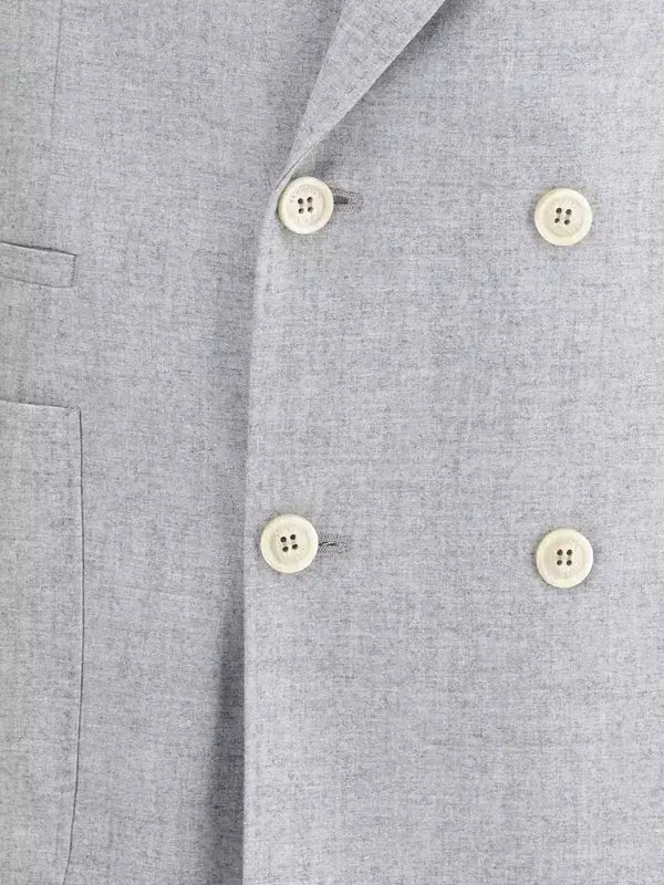 Close-up of a gray suit jacket with buttons