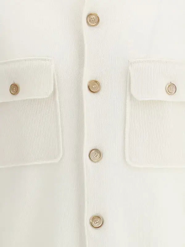 Close-up of a white shirt with button details