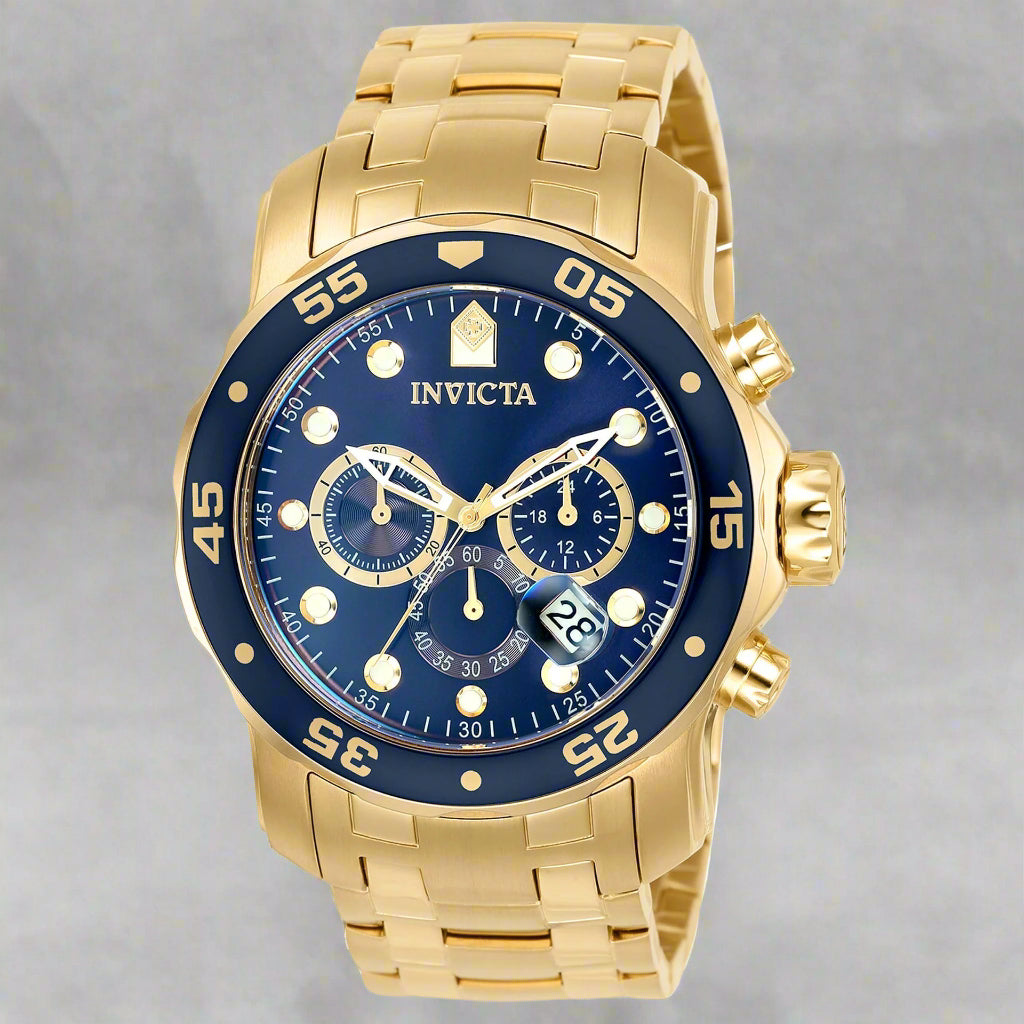 INVICTA Pro Diver men's watch with stainless steel band INVICTA black graphic t-shirt with logo front Gold-tone INVICTA chronograph wristwatch close-up INVICTA men's button-down shirt with embroidered detail INVICTA oversized sport watch and branded appar