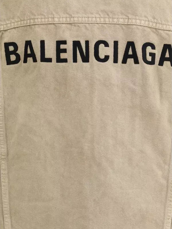 Beige jacket with 'BALENCIAGA' branding on a beige background