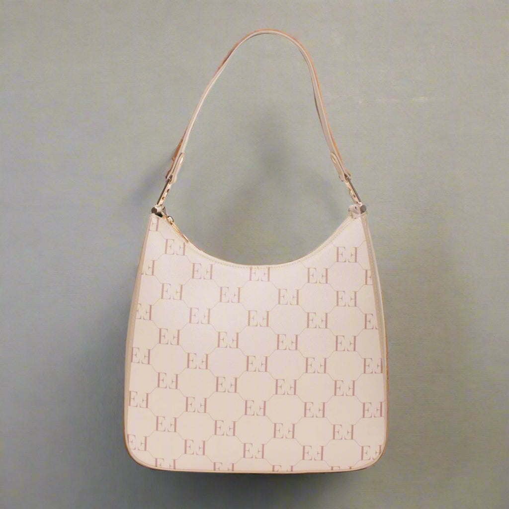 Beige handbag with a pattern on a white background