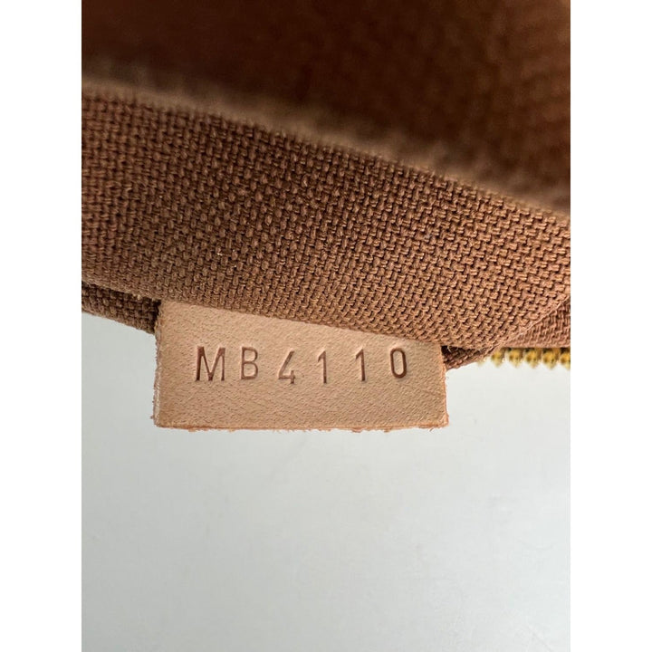 Close-up of a brown fabric with a label displaying 'MB4110' on a white background