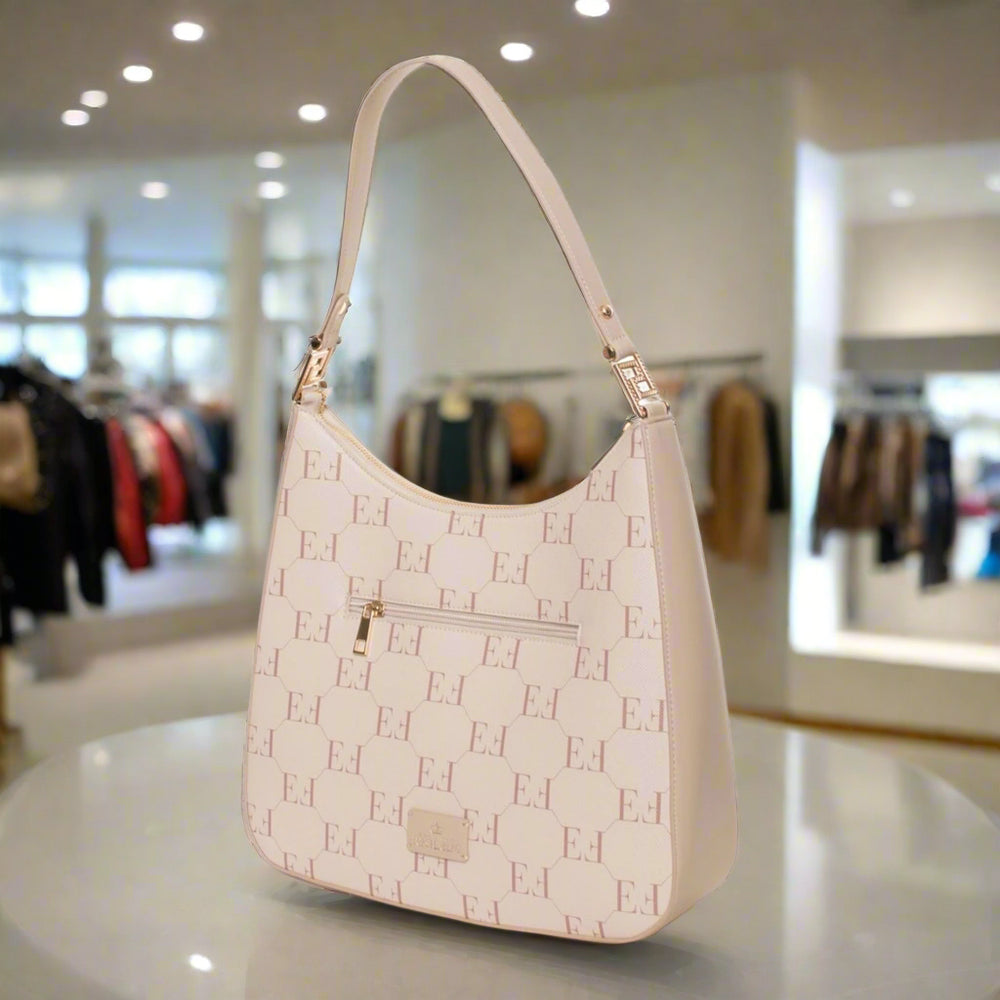 Beige handbag with a subtle pattern on a white background