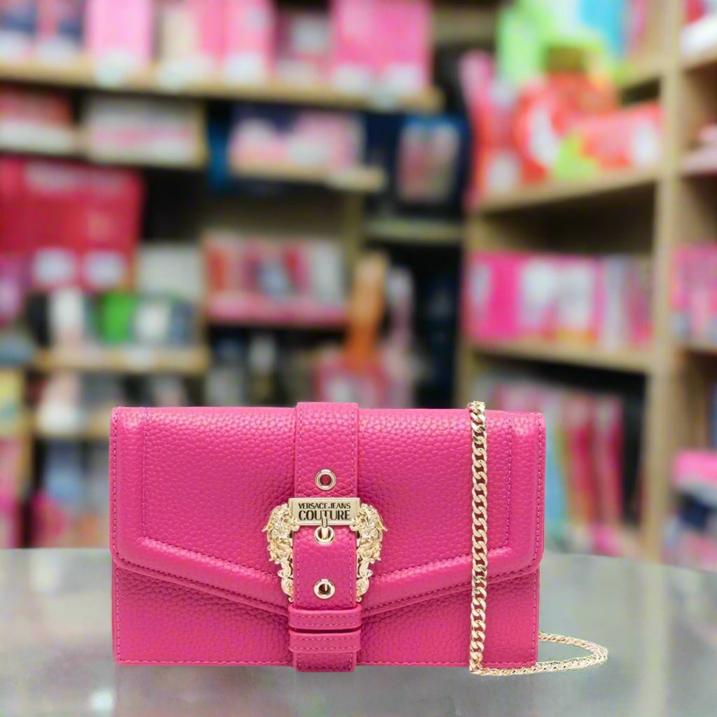Versace Jeans Couture pink wallet with gold emblem, perfect for women, featuring card slots and stylish design.