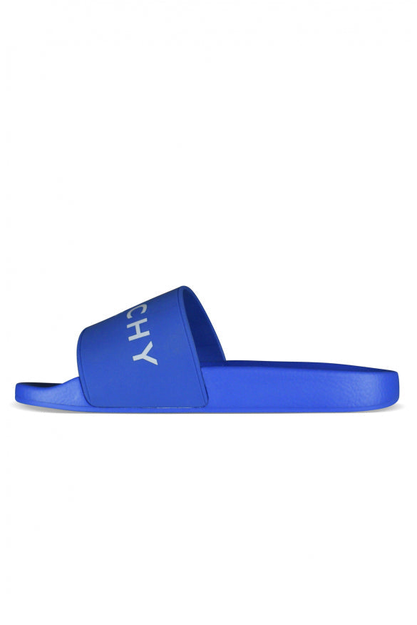 Blue slide sandal with white text on a white background