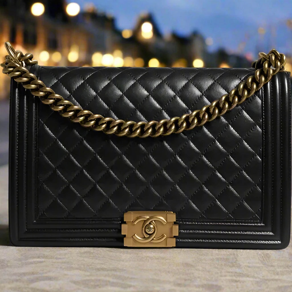 Preloved CHANEL classic quilted handbag front view Authentic CHANEL black leather flap bag CHANEL gold chain shoulder bag – preloved Vintage CHANEL logo clutch purse Secondhand CHANEL luxury tote with dust bag