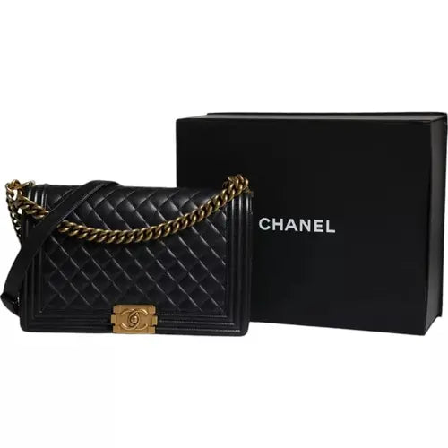 Preloved CHANEL classic quilted handbag front view Authentic CHANEL black leather flap bag CHANEL gold chain shoulder bag – preloved Vintage CHANEL logo clutch purse Secondhand CHANEL luxury tote with dust bag