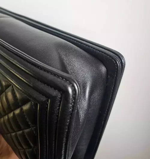 Preloved CHANEL classic quilted handbag front view Authentic CHANEL black leather flap bag CHANEL gold chain shoulder bag – preloved Vintage CHANEL logo clutch purse Secondhand CHANEL luxury tote with dust bag