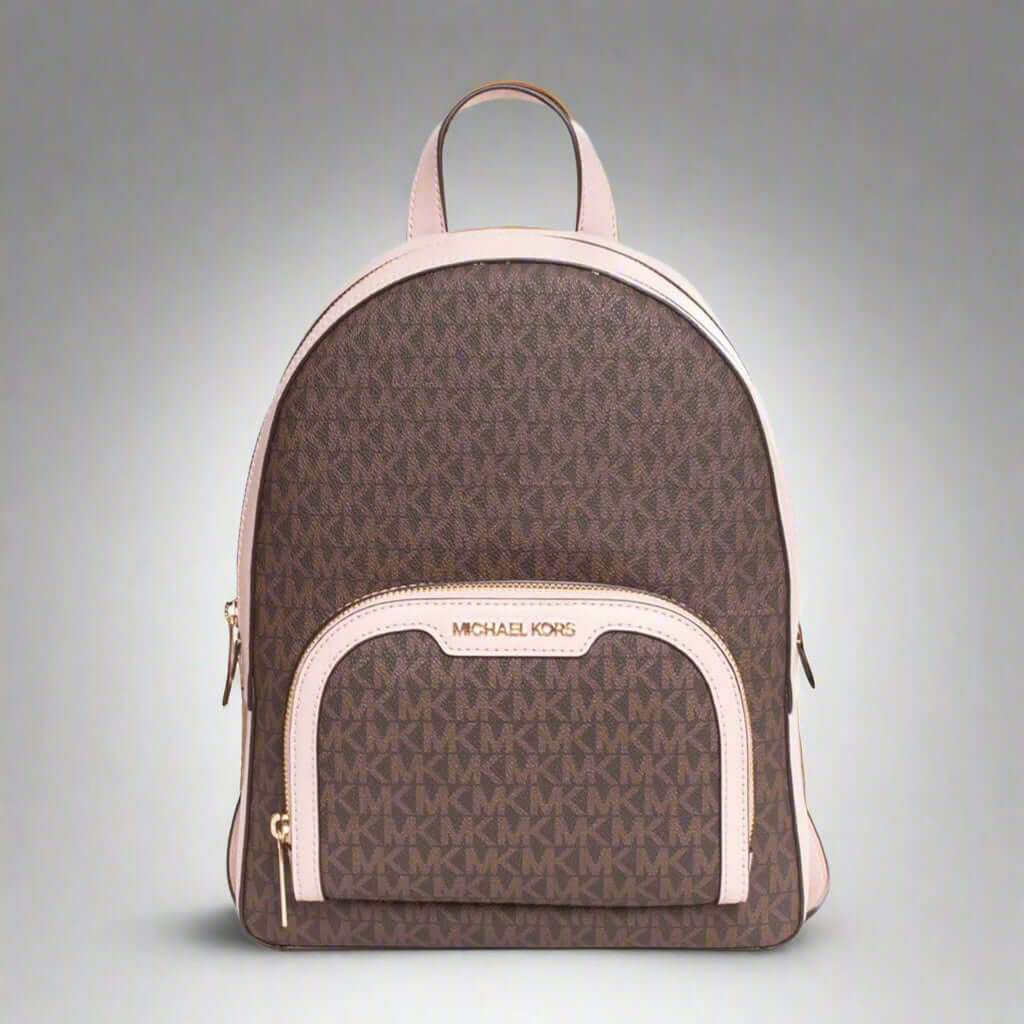 Brown backpack with pink accents and Michael Kors logo on a white background
